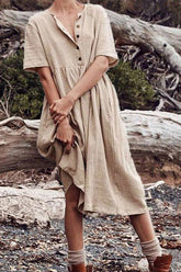 Vestido midi liso con cuello redondo y botones